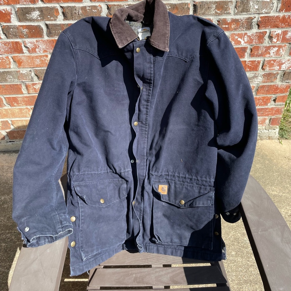 Navy Carhartt coat with flannel interior